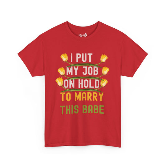 Red t-shirt with floral design and text on a white background