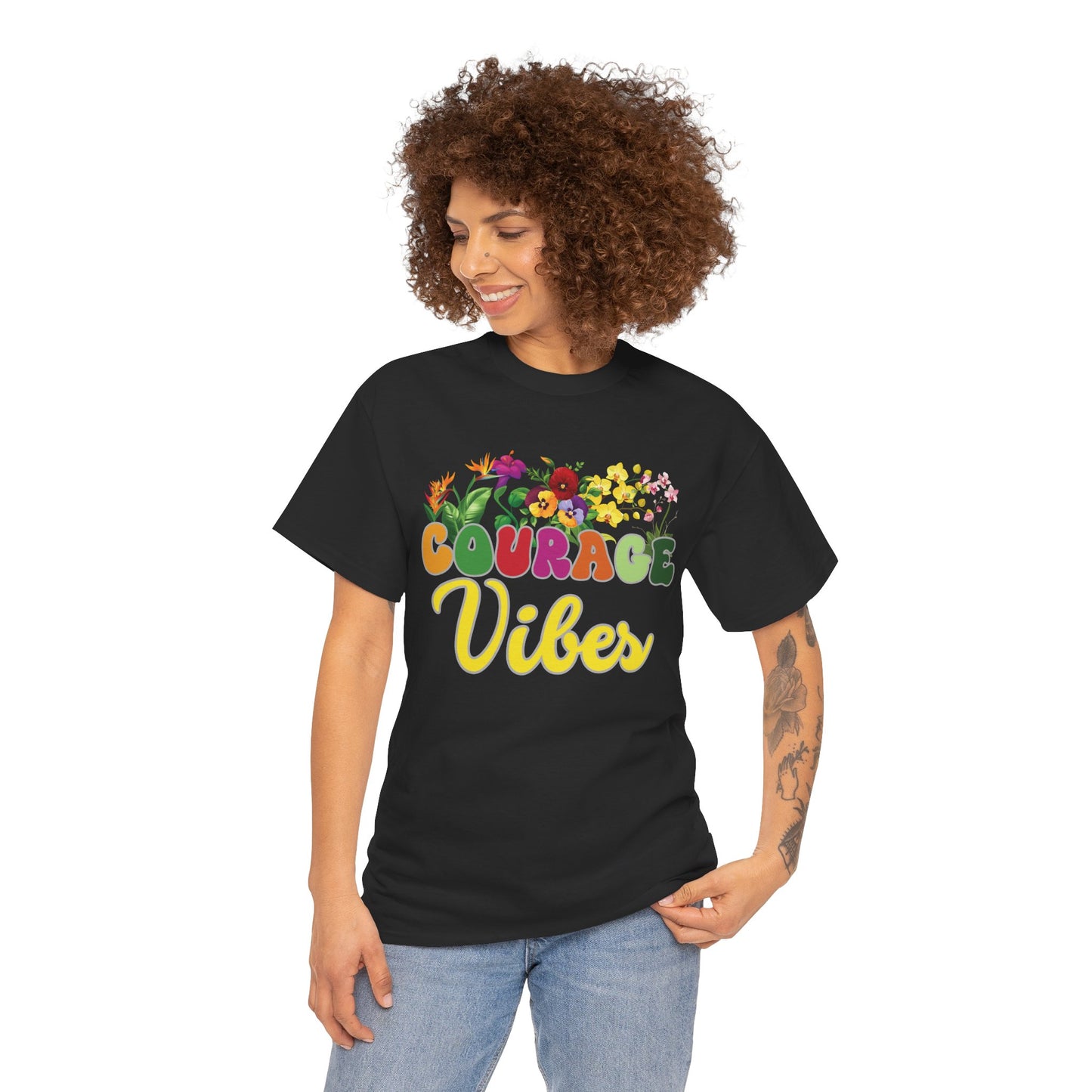 Motivational shirt. Person wearing a black t-shirt with 'Courage Vibes' design on a white background