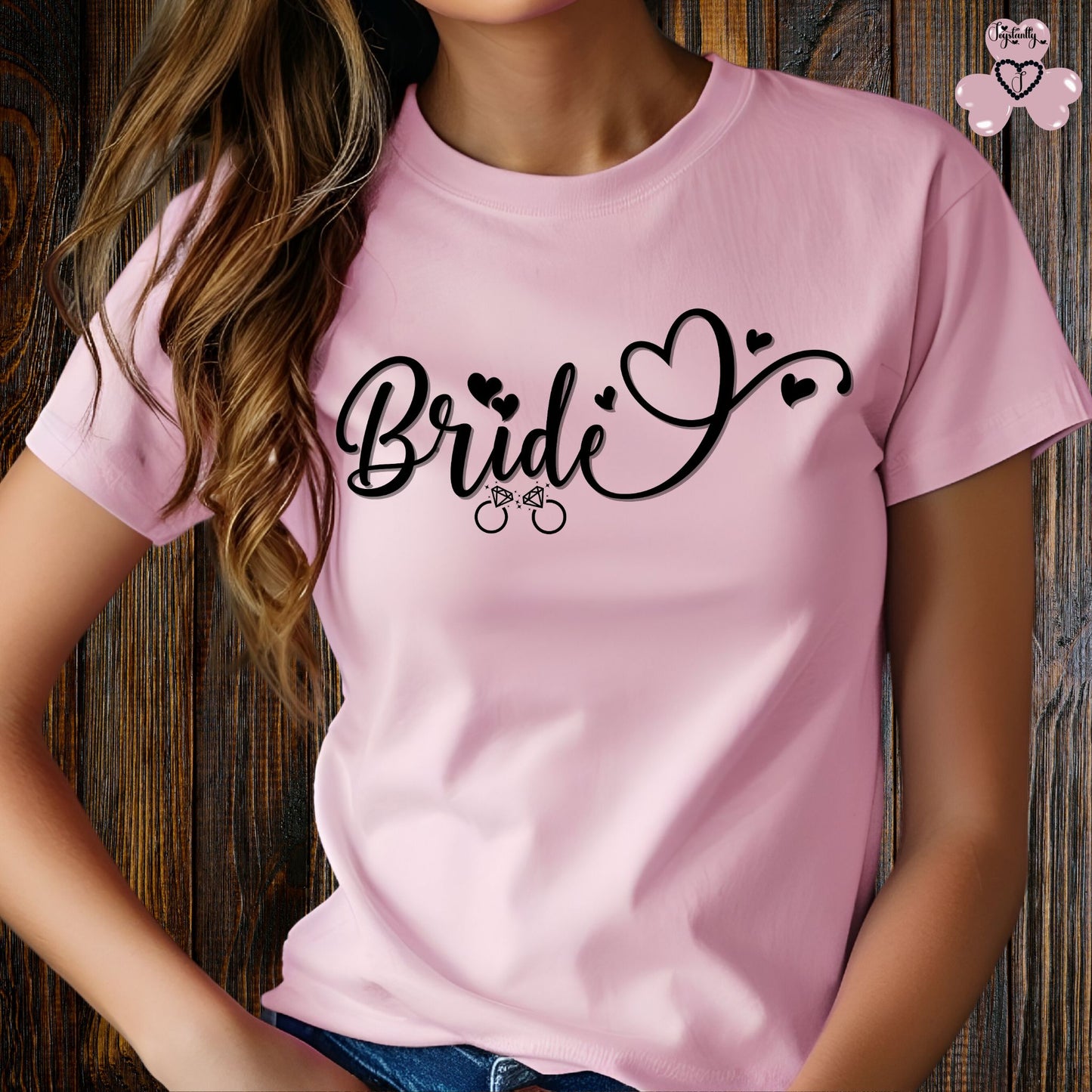 Super Shirt for Engagements, Bachelorettes, Hen and Bridal Parties. Pink t-shirt with 'Bride' text on a wooden background