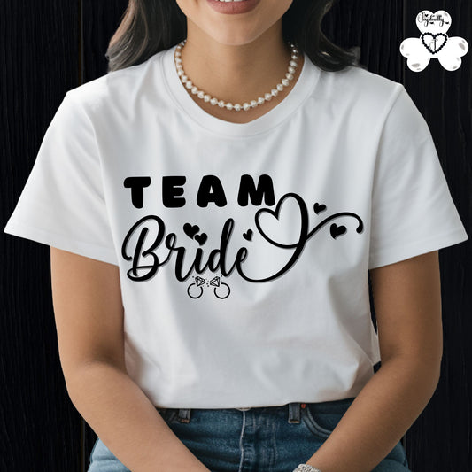 Shirt for Engagements, Bachelorettes, Hen and Bridal Parties. White t-shirt with 'Team Bride' text worn by a person on a black background