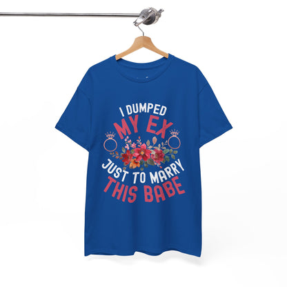 Blue t-shirt with humorous text and floral design on a hanger against a white background