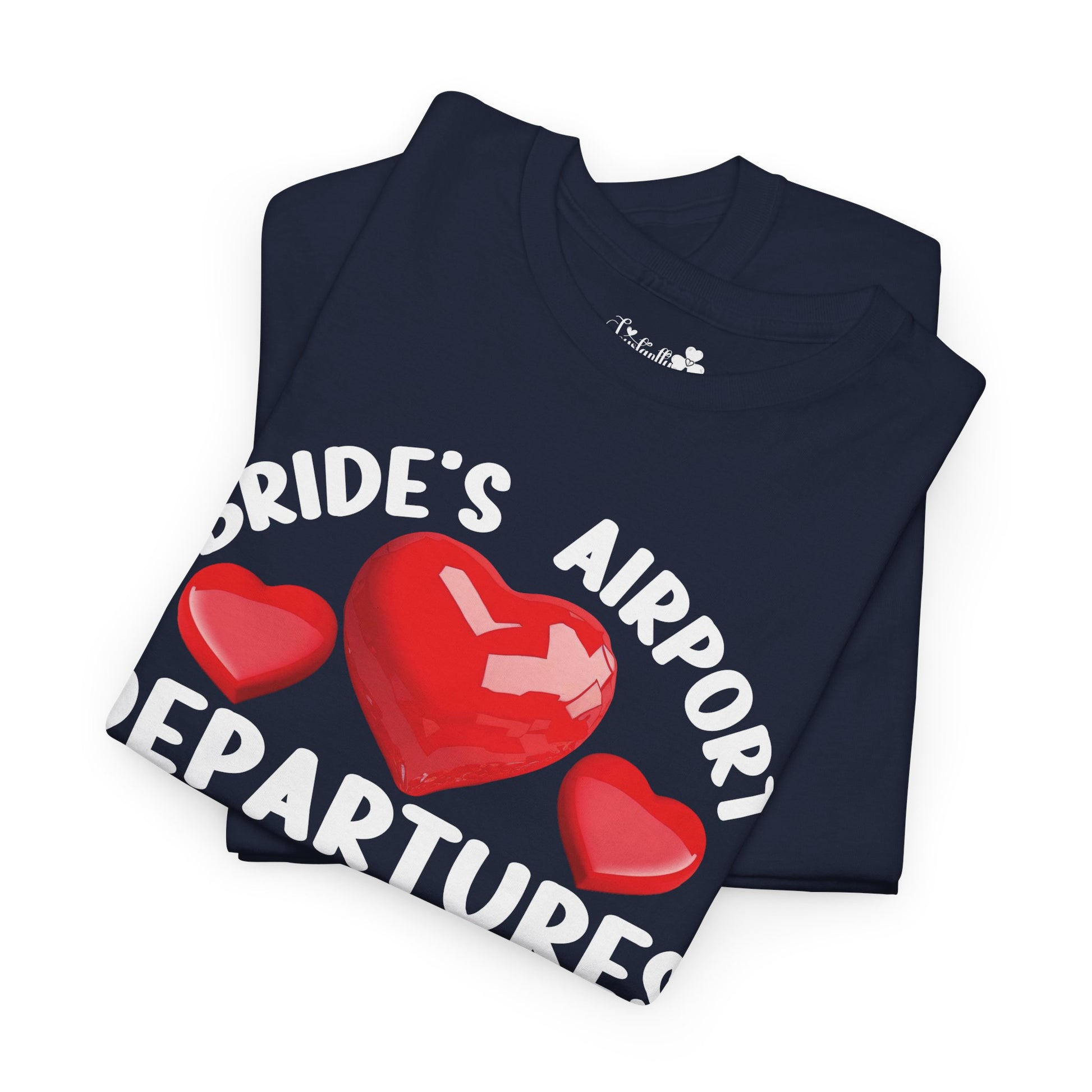 Folded navy blue t-shirt with red hearts and white text on a white background