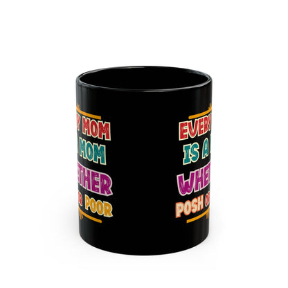 Black mug with colorful text design on a white background