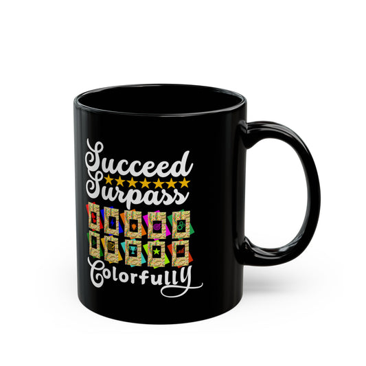 Black mug with a colorful text design on a white background