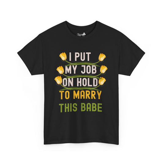 Black t-shirt with yellow and green text and graphics on a white background