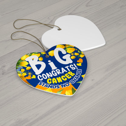 Cancer Motivational Ceramic Ornament of Victory. Heart-shaped decorative tag with floral design and text on a wooden surface