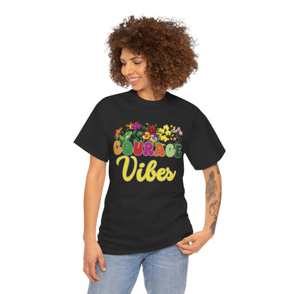 Motivational shirt. Person wearing a black t-shirt with 'Courage Vibes' design on a white background