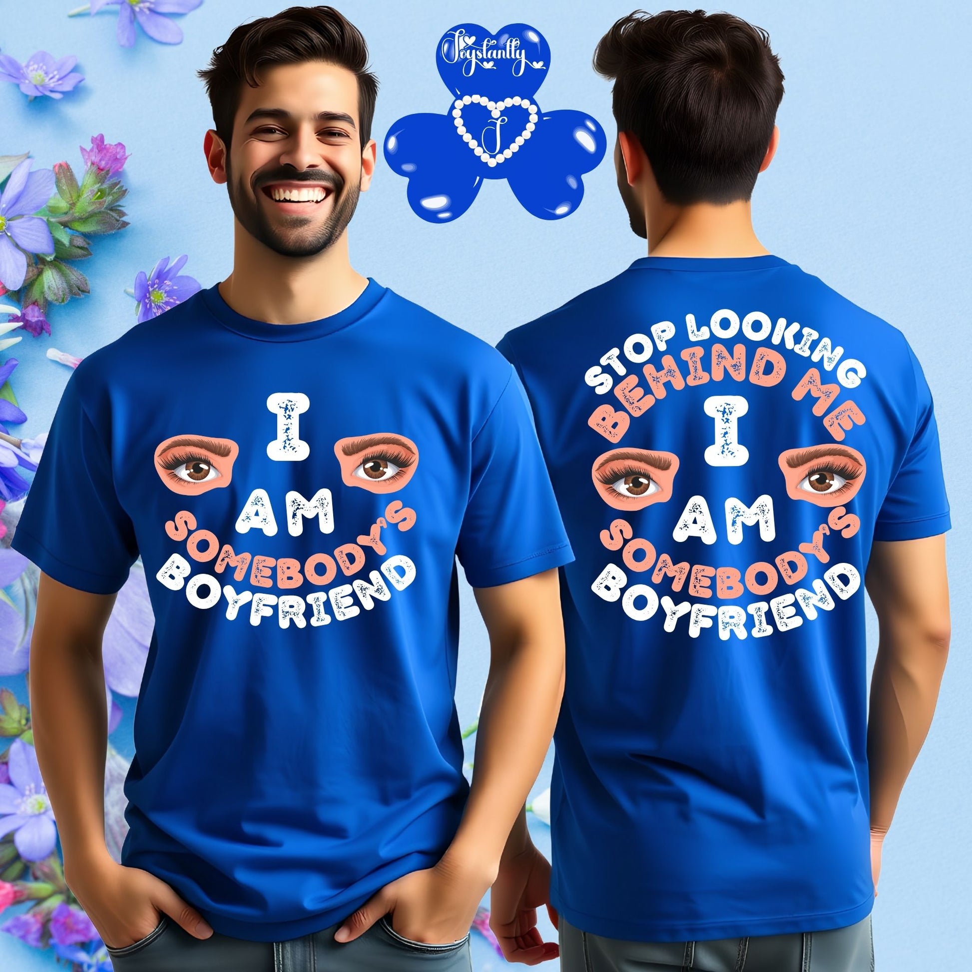 Person wearing a blue t-shirt with text and eye illustrations, standing in front of a colorful floral background.