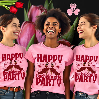 Three women wearing pink 'Happy Bachelorette Party' t-shirts with tulips in the background.