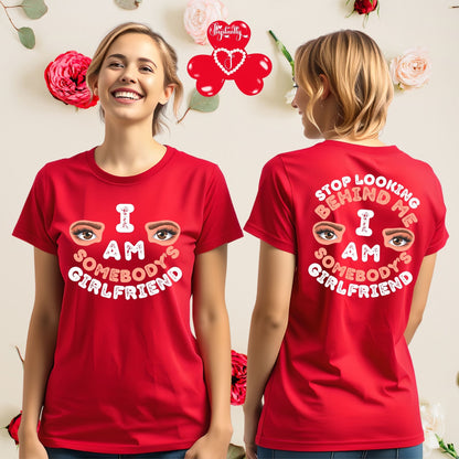 Red t-shirt with text and eye design worn by a person, displayed front and back.