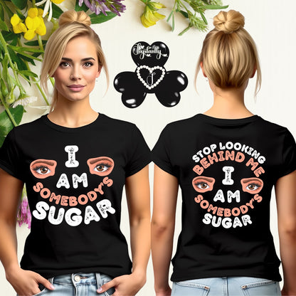Person wearing a black t-shirt with a motivational quote, front and back views, with decorative elements.