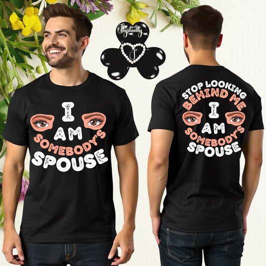 Black t-shirt with humorous text design worn by a person, with a decorative background.