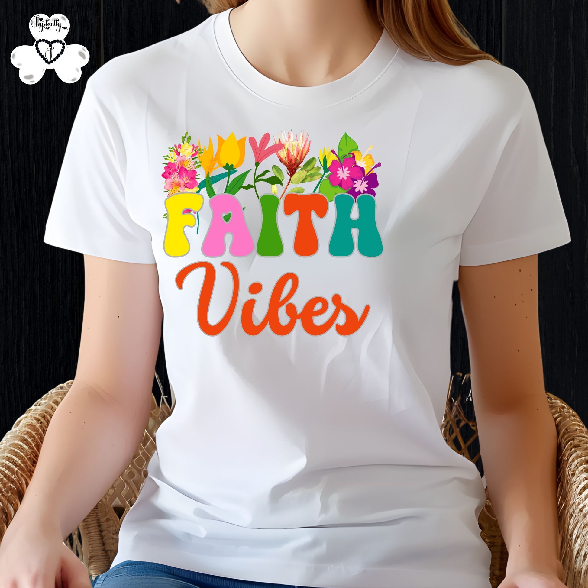 Motivational Shirts for Positive Affirmations. White t-shirt with colorful 'Faith Vibes' design on a person sitting on a wicker chair.