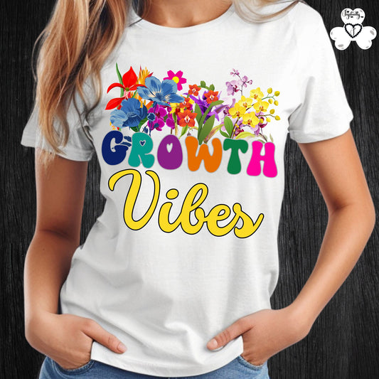 Motivational T-shirt for positive affirmations. White t-shirt with colorful floral design and 'Growth Vibes' text on a black background