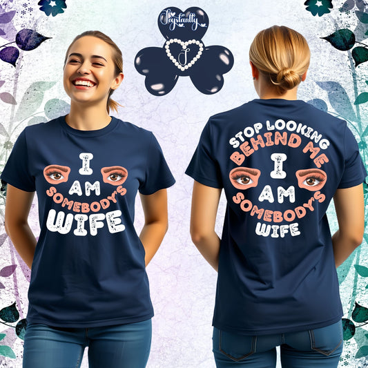 Two people wearing navy blue t-shirts with humorous text and eye graphics, on a decorative background.